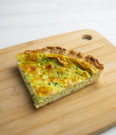 Photo for Portion of Vegetarian French Quiche with egg, onion and zucchini. - Royalty Free Image