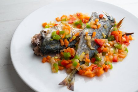 Photo for Baked mackerel with pepper, onion and carrot. - Royalty Free Image