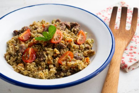 Photo for Couscous with vegetables and beef marinated with fresh mint. - Royalty Free Image
