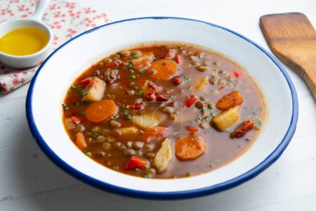Photo for Spicy lentil stew with potatoes and carrots. - Royalty Free Image