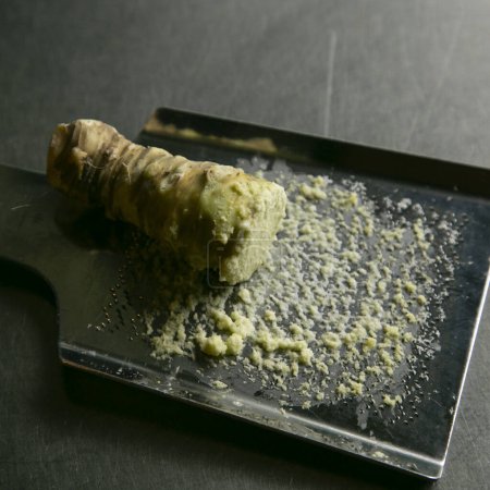 Photo for Fresh grated wasabi at a Japanese restaurant in Tokyo, Japan. - Royalty Free Image
