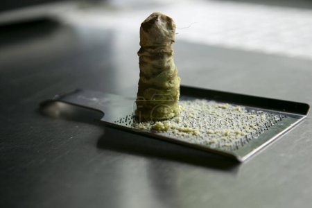 Photo for Fresh grated wasabi at a Japanese restaurant in Tokyo, Japan. - Royalty Free Image