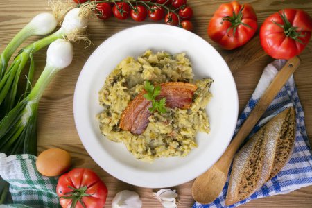 Photo for Trinxat de la Cerdaa. Typical recipe from the north of Catalonia cooked with white cabbage, potato and bacon. - Royalty Free Image