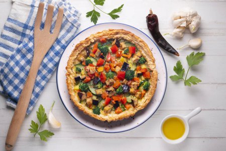 Photo for Veggie quiche traditional french recipe on puff pastry. - Royalty Free Image