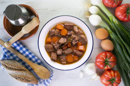 Photo for Beef stew with carrots. Traditional tapa from the central area of Spain. - Royalty Free Image