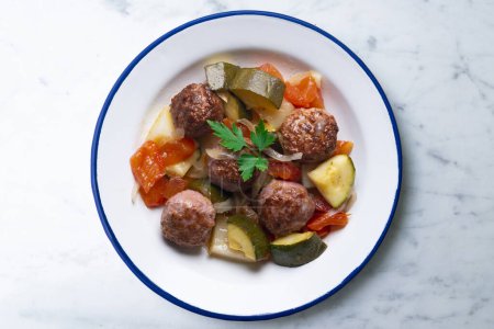 Photo for Meat meatballs with tomato sauce and vegetables. Traditional Spanish tapa recipe. - Royalty Free Image