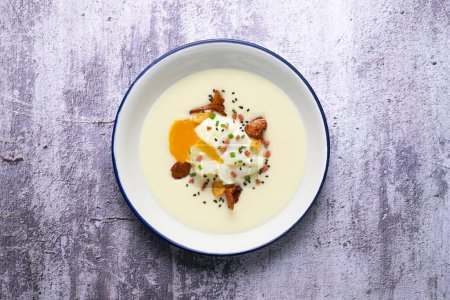 Photo for Poached egg with potato cream and mushrooms - Royalty Free Image