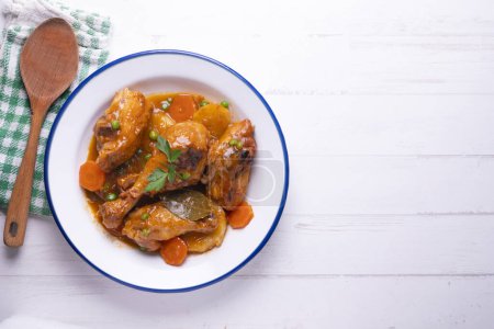 Photo for Chicken thighs cooked in the oven with vegetables. - Royalty Free Image