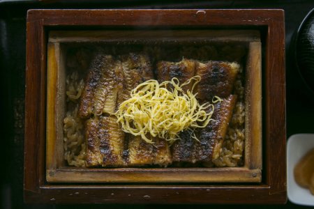 Photo for Unagi seiro mushi. Steamed eel rice bowl is one of Yanagawas famous local dishes. - Royalty Free Image