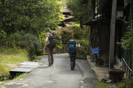 Photo for Magome, Japan; 1st October 2023: Walking the hiking road following the Nakasendo trail between Tsumago and Magome in Kiso Valley, Japan. - Royalty Free Image