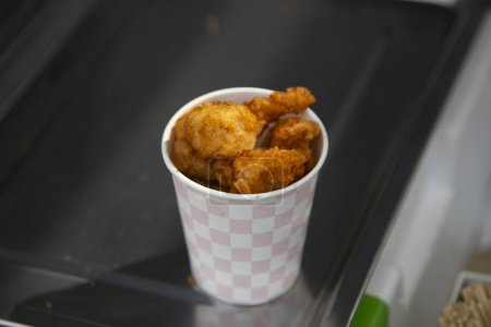 Photo for Karaage style chicken at a street stand in Tokyo. Karaage is a very typical Japanese frying technique. - Royalty Free Image