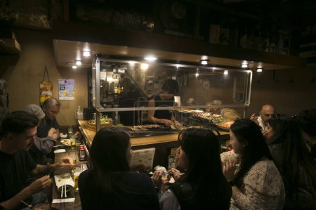 Photo for Tokyo, Japan; 1st October 2023: Atmosphere at Izakaya restaurant on Omoide Yokocho Street in the Shinjuku district of Tokyo. - Royalty Free Image