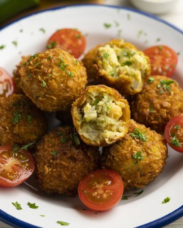 Photo for Spanish chickpea croquettes with eggplant and zucchini. - Royalty Free Image