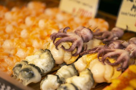 Seafood at a food stall at the Tsukiji Outer Market in the city of Tokyo, Japan.