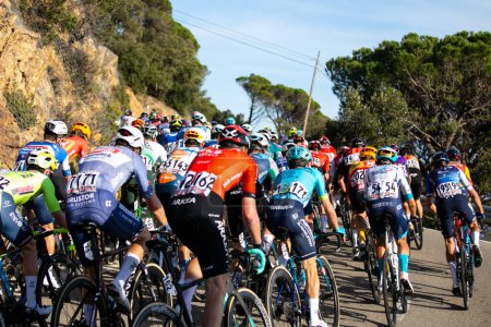 Photo for Sant Feliu de Guixols, Spain 18th March 2024: International UCI Teams Peloton during stage 1 of La Volta Catalunya 24. - Royalty Free Image