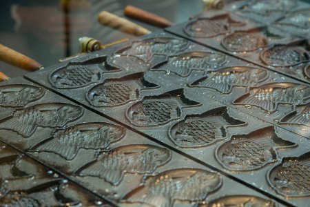 Taiyaki is a Japanese fish-shaped cake, commonly sold as street food