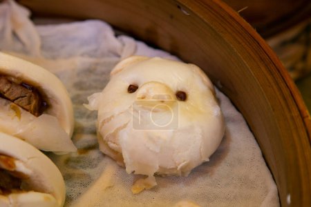 Photo for Pork Buns Fluffy steamed wheatflour buns filled with mushrooms and hoisin sauce. - Royalty Free Image