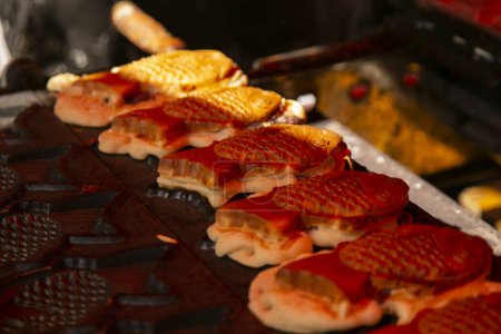Taiyaki is a Japanese fish-shaped cake, commonly sold as street food