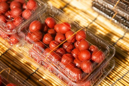 Umeboshi is a traditional Japanese dish, an ume pickle that is dried, salted in barrels, and a weight is placed on top to squeeze out the juice.