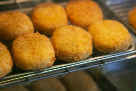 Japanese croquettes are called Korokke () and the classic style is made of mashed potatoes mixed with sauteed ground beef and onion. 