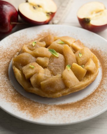 Tarte Tatin is a variant of apple pie in which the apples have been caramelized in butter and sugar before adding the dough.