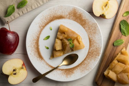 Photo for Tarte Tatin is a variant of apple pie in which the apples have been caramelized in butter and sugar before adding the dough. - Royalty Free Image