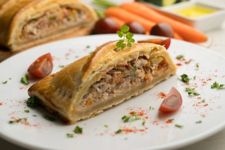 Photo for Traditional Galician empanada filled with vegetables and anchovies. Traditional recipe from the northern part of Spain. - Royalty Free Image