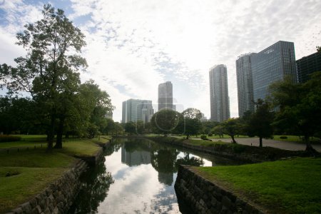 The Gardens of Hamarikyu are a public park in Ch, Tokyo, Japan. Located at the mouth of the Sumida River they are surrounded by modern buildings.