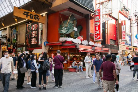 Photo for Osaka, Japan; 20th October 2023: Restaurants and tourists in Dotonbori streets full of street food stands and nightlife. - Royalty Free Image
