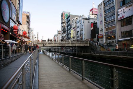 Photo for Osaka, Japan; 20th October 2023: Famous canal in Dotonbori full of businesses and restaurants. - Royalty Free Image