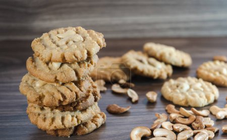 Photo for Keto cookies and cashews arranged on a wooden container - Royalty Free Image