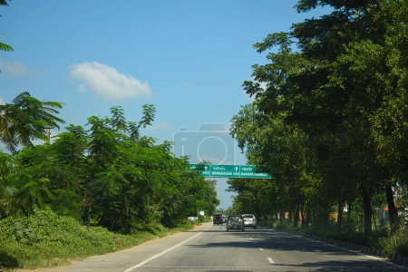 Photo for A Road Direction Board on National Highway 37 of Assam showing distance of places - Royalty Free Image