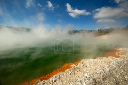 Foto de Rotorua, New Zealand - 10 August, 2016: The Waiotapu Thermal Park in Rotorua contains mud pools, geysers and lakes affected by constant thermal activity - Imagen libre de derechos