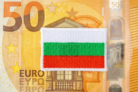 Foto de Flag of Bulgaria and Euro banknotes. The concept of Bulgaria joining the Euro zone, Adoption of the single European currency - Imagen libre de derechos