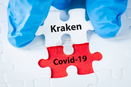 2023, Neue Variante des Coronavirus, Krakenvirus, XBB.1.5-Omicron-Mutation, Konzept eines Arztes, der ein Puzzle mit den Namen covid und kraken hält