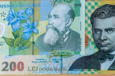 Téléchargez les photos : Roumanie argent, billets de 1 et 200 lires roumaines, concept financier, hausse des prix - en image libre de droit