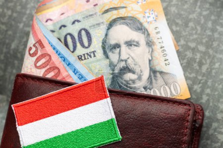 Photo for Hungarian money, forints, sticking out of a wallet, financial and economic concept, national symbol of hungary, close up - Royalty Free Image