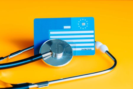 Photo for European health insurance card, concept, EU document confirming the right to treatment outside their own country, travel insurance for Europeans traveling to EU and EFTA countries - Royalty Free Image