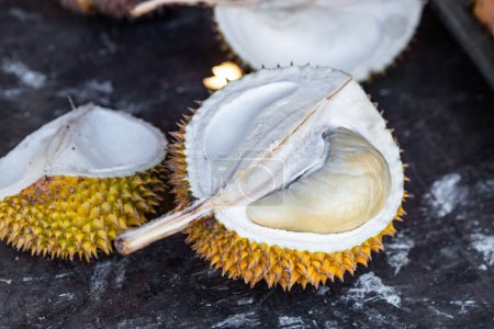 Photo for Durian fruit cut in half, a smelly fruit, a specific fruit from Asia - Royalty Free Image