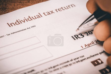 Foto de Declaración de impuestos individual en Nueva Zelanda, Rellenar y presentar un formulario de impuestos, concepto financiero, impuestos en Nueva Zelanda - Imagen libre de derechos
