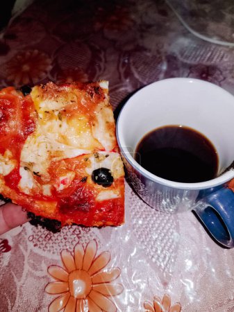 Photo for A piece of pizza with a cup of coffee - Royalty Free Image