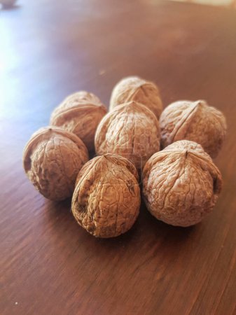 Photo for Walnut scene on a table - Royalty Free Image