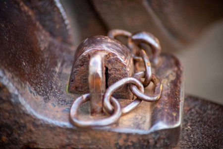 Photo for Rusty metal chain on a metallic eyelet. High quality photo - Royalty Free Image