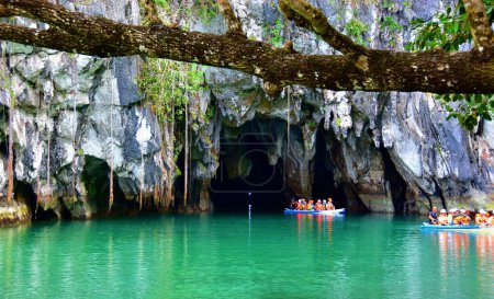 Photo for Palawan, Philippines - tourists on the boats visiting Puerto Princesa subterranean underground river - Royalty Free Image