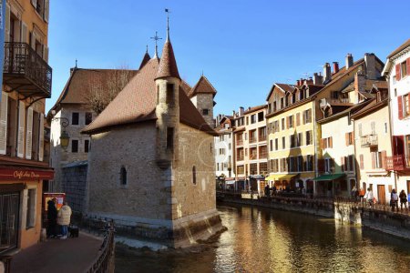 Photo for Annecy, Haute-Savoie, France - February 14, 2023: View of Palais de l'Isle, an old prison, and Thiou river. - Royalty Free Image