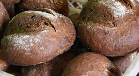 Photo for Fresh baked Rye bread on the table - Royalty Free Image