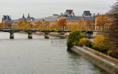 Photo for Paris, France - November 27: scenic view of the Paris city during traveling on cruise ship along Seine river - Royalty Free Image