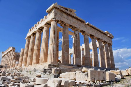 Photo for Parthenon temple in sunny day. Acropolis in Athens, Greece. The Parthenon is a temple on the Athenian Acropolis in Greece, dedicated to the goddess Athena. - Royalty Free Image
