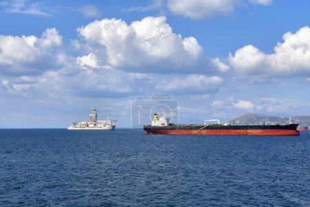 Photo for Saronic gulf, Attica, Greece - October 19, 2021: Tanker ship anchored near port of Piraeus. - Royalty Free Image