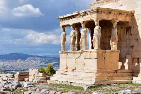 Photo for Porch of the Caryatids at temple of Athena Pollias or the Erechtheion at Acropolis site on a sunny evening in Athens Greece. - Royalty Free Image